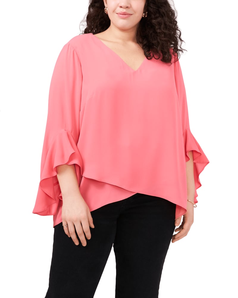 Front of a model wearing a size 1X Natalie Flutter Sleeve Tunic in CARMINE PINK by Vince Camuto. | dia_product_style_image_id:261766